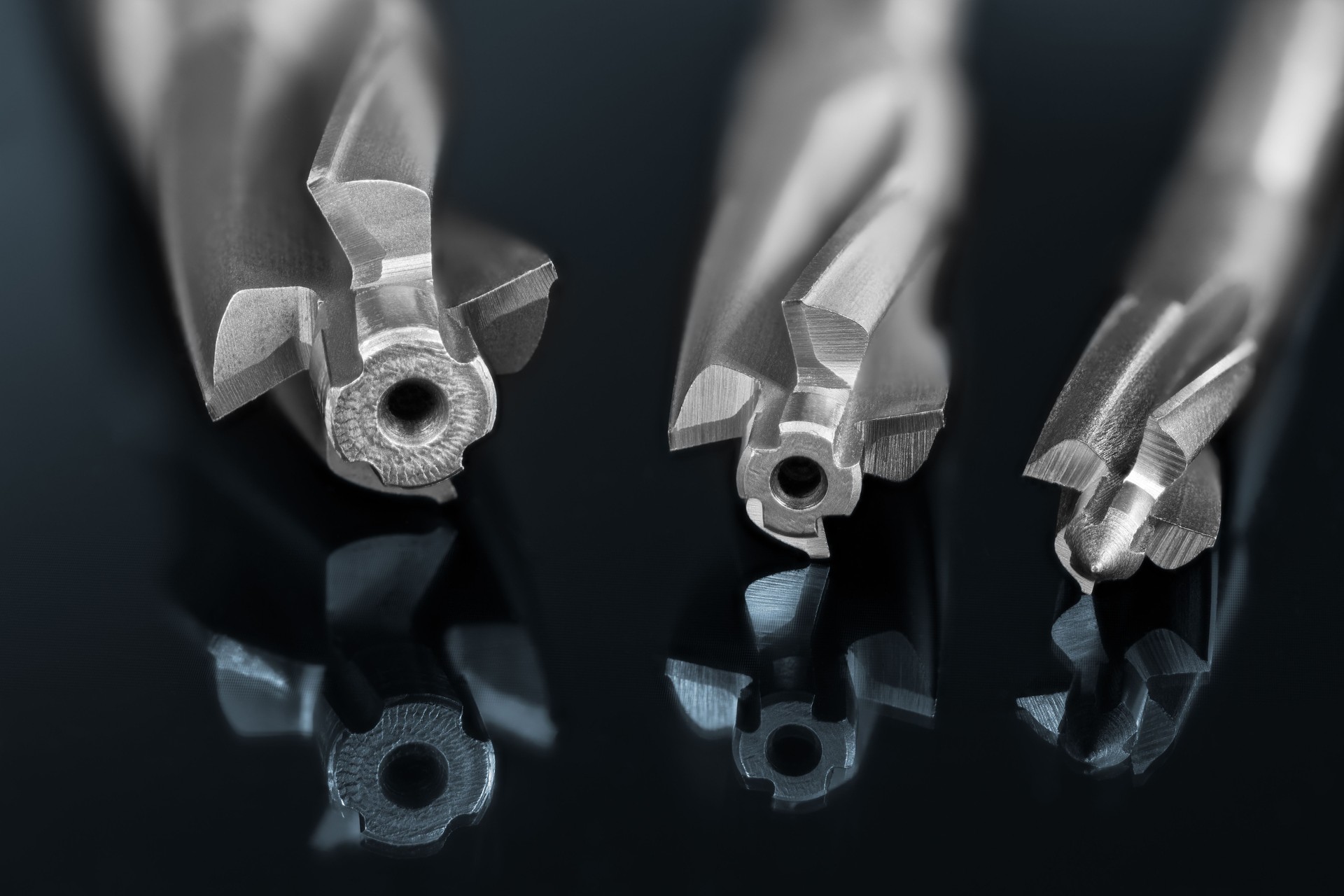 End mills. Countersink drill bit. Artistic detail. Mirroring in glass. Machining